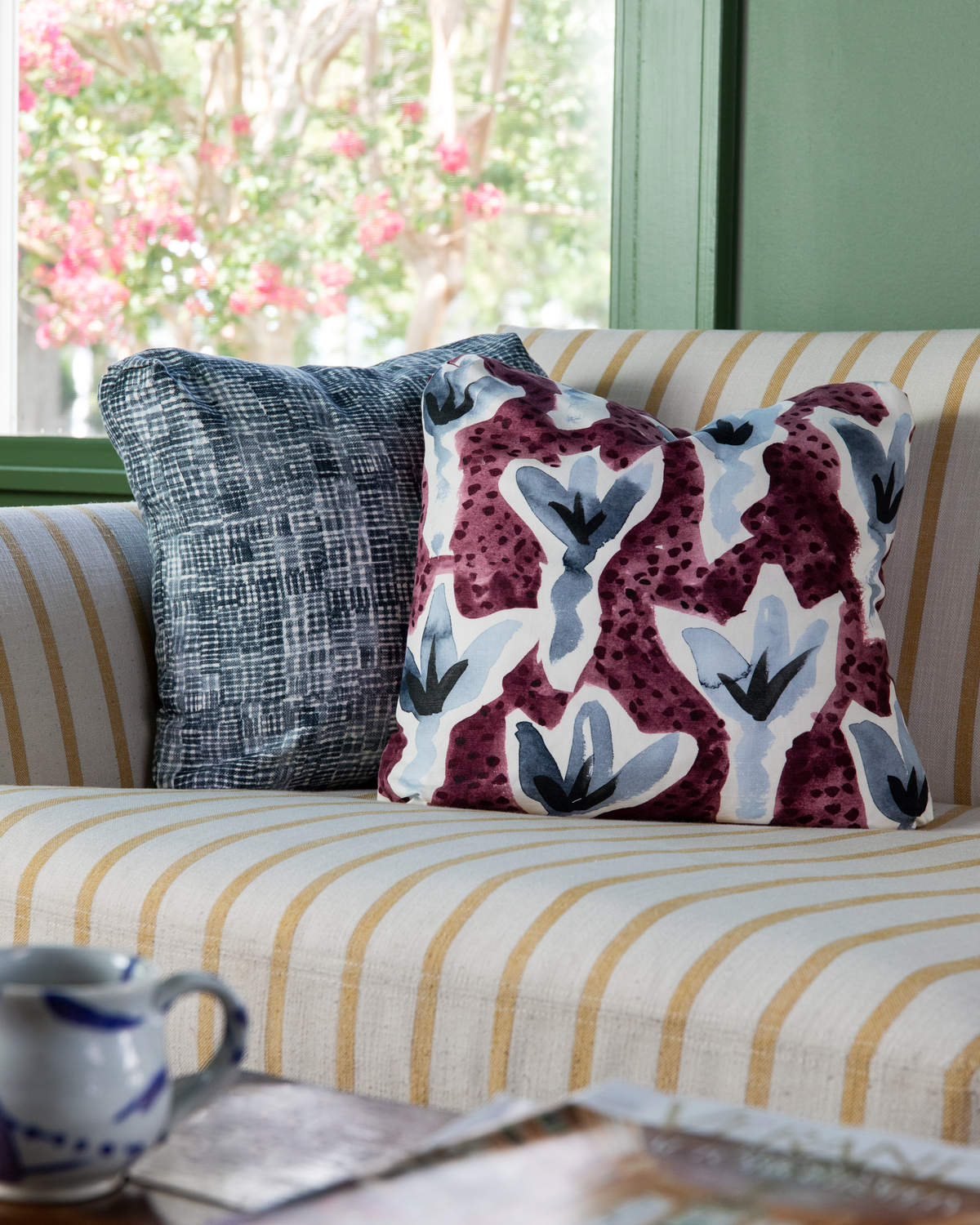Market Stripe Upholstery in Goldenrod, Hatchmarks in Navy Pillow, and Sprigs in Eggplant/Blue Pillow