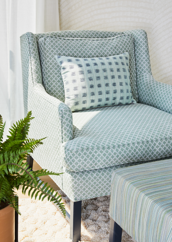 Lattice in Grass Chair Upholstery, Horizon in Field Ottoman Upholstery, Gridded Ikat in Dennis Green Pillow and Arches Wallpaper in Parchment