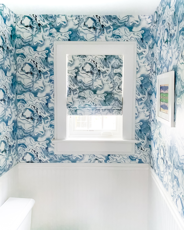 Marble Wallpaper in Ocean + Marble Roman Shade in Sea Blue