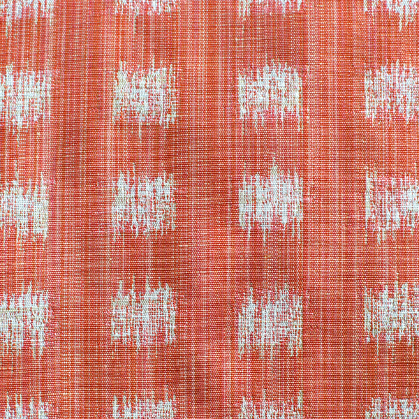 Gridded Ikat Fabric in Coral