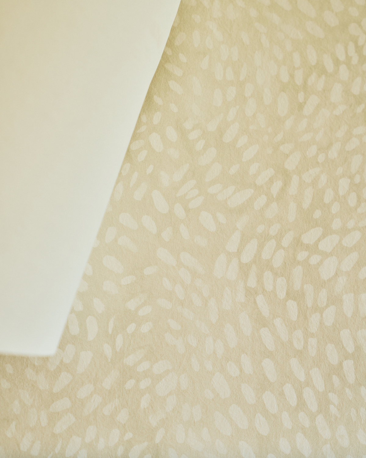 Speckled Wallpaper in Sand
